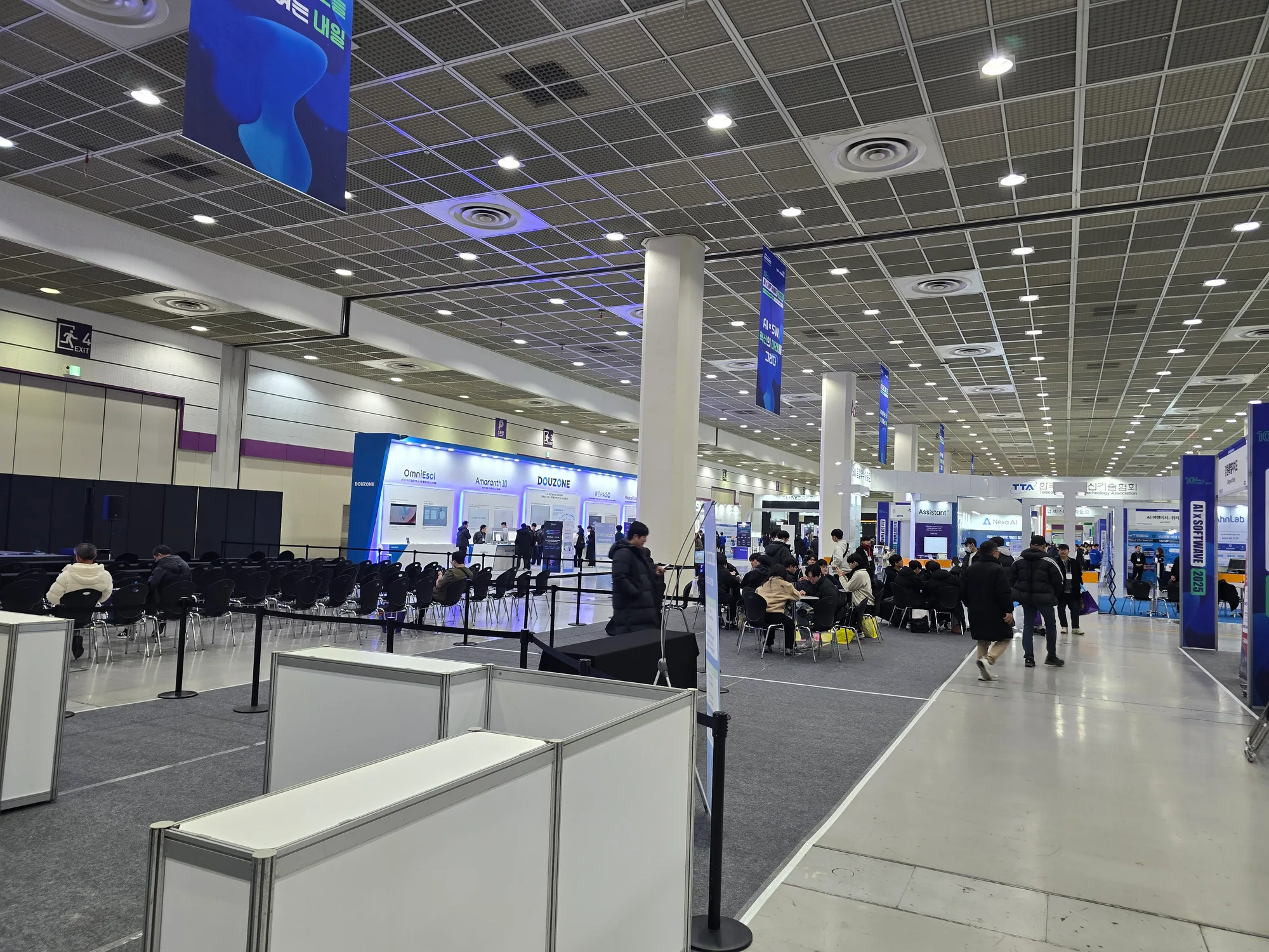 Visitors and exhibition booths inside COEX A Hall